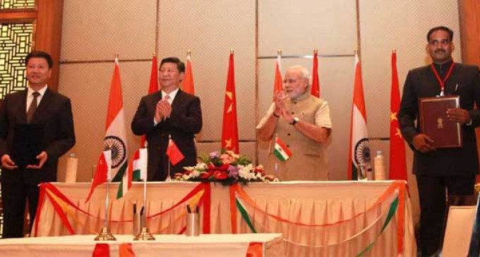 The Prime Minister, Narendra Modi and the Chinese President, Xi Jinping witnessing the signing of an MoU