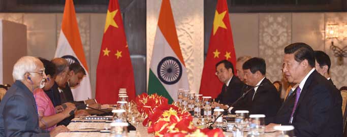 The Vice President, Mohd. Hamid Ansari meeting the Chinese President, Xi Jinping, in New Delhi.