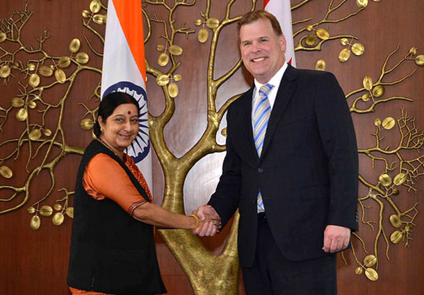 Indian Foreign Minister Sushma Swaraj with Minister of Foreign Affairs of Canada John Baird