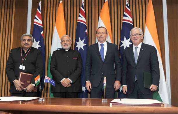 PMi Narendra Modi and the PMof Australia, Tony Abbott witnessing the signing of agreements, at Parliament House, in Canberra