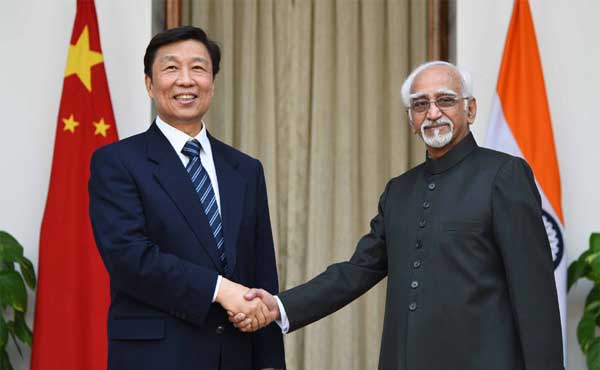 The Vice President, Mohd. Hamid Ansari meeting the Vice President of the People’s Republic of China, Li Yuanchao, in New Delhi.