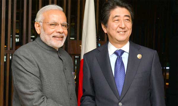 Prime Minister, Narendra Modi meeting the Prime Minister of Japan, Shinzo Abe, at Kuala Lumpur, in Malaysia.