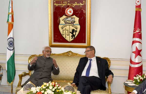 Vice President, M. Hamid Ansari with the Prime Minister of Tunisia, Habib Essid on his arrival, in Tunisia.