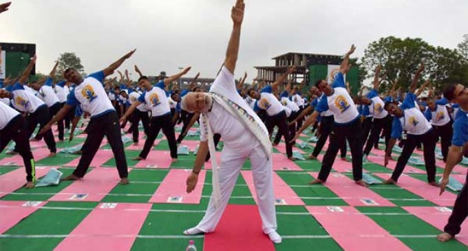 Yoga no religious activity, a global mass movement: Modi