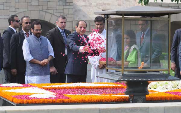 The President of the Arab Republic of Egypt, Abdel Fattah el-Sisi paying floral tributes at the Samadhi of Mahatma Gandhi, at Rajghat, in Delhi on September 02, 2016. The Minister of State for Minority Affairs (Independent Charge) and Parliamentary Affairs, Mukhtar Abbas Naqvi is also seen.