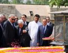 President of the State of Palestine, Mahmoud Abbas paying floral tributes at the Samadhi of Mahatma Gandhi,