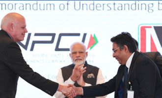PM Modi launches RuPay card in UAE, buys 1 kg laddoos