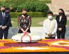 The Prime Minister of Kingdom of Denmark, Mette paying homage at the Samadhi of Mahatma Gandhi, at Rajghat,