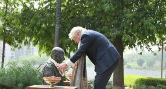 Boris Johnson visits Sabarmati Ashram, tries his hand at spinning on ‘Charkha’