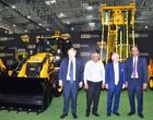 UK PM hops onto bulldozer at JCB plant in Gujarat