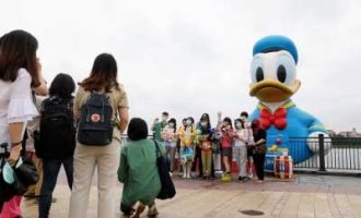 Shanghai Disneyland reopens after Covid-triggered closure