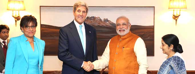 The US Secretary of State, John Kerry and the US Secretary of Commerce, Penny Pritzker calling on the Prime Minister, Narendra Modi, in New Delhi on August 01, 2014. The Union Minister for External Affairs and Overseas Indian Affairs, Sushma Swaraj is also seen.