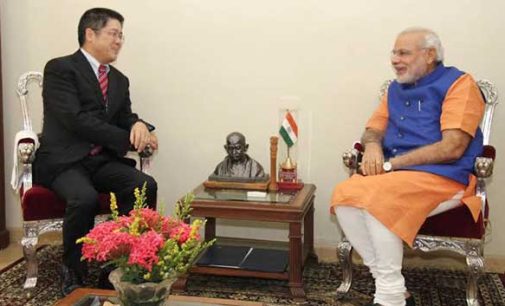 The Chinese Ambassador, Le Yucheng calling on the Prime Minister, Narendra Modi, in Gujarat.