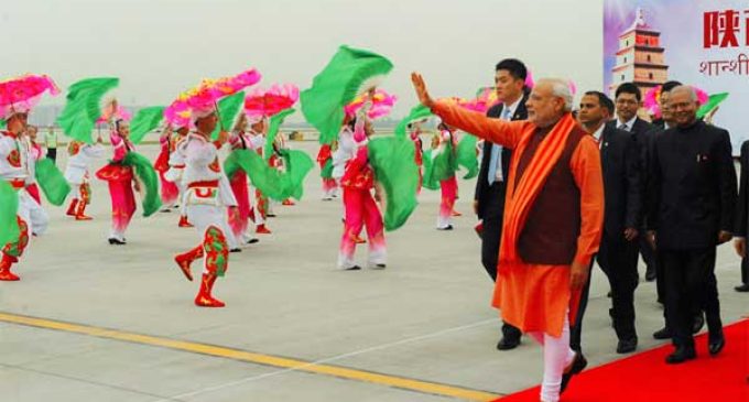 Chinese traditional dancers welcoming the PM, Narendra Modi at Xi’an Xiangyang International Airport,