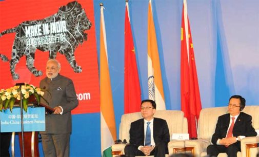 The Prime Minister, Narendra Modi delivering his address at the India-China Business Forum, in Shanghai,