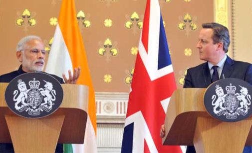 Prime Minister, Narendra Modi delivering his statement to the media with the Prime Minister of United Kingdom (UK), David Cameroon,