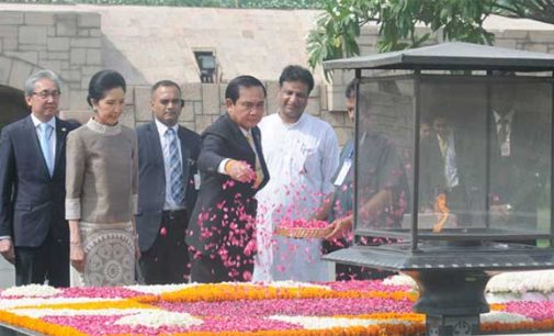 Prime Minister of the Kingdom of Thailand, General Prayut Chan-o-cha paying floral tributes at the Samadhi of Mahatma Gandhi