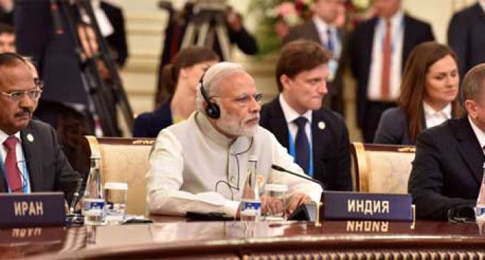 The Prime Minister, Narendra Modi at the extended meeting of the Member States and Observer countries,