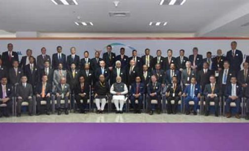 Prime Minister, Narendra Modi in the group photograph with the Global CEOs, at the Vibrant Gujarat Global Summit 2017