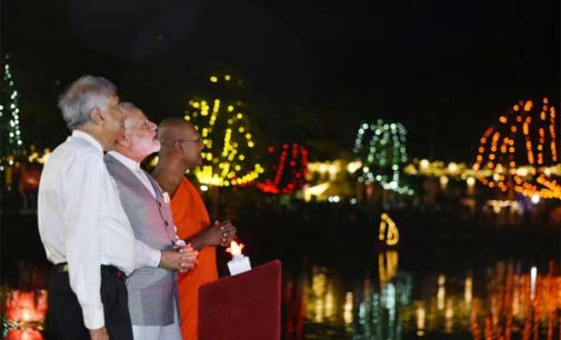 Modi lights up lamps at Sri Lankan temple