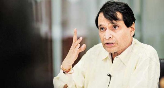Commerce Minister Suresh Prabhu takes up H-1B, L-1 visa issues strongly with US