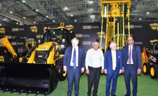 UK PM hops onto bulldozer at JCB plant in Gujarat